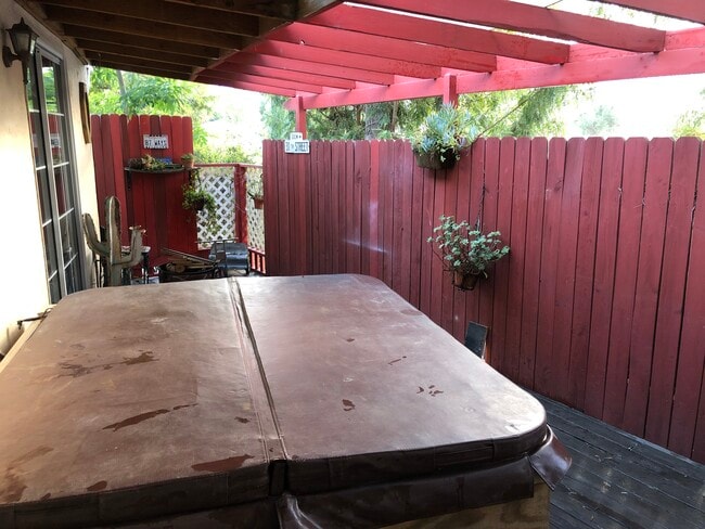 Patio with hot tub. - 4201 Topanga Canyon Blvd Unit 60