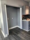 Pantry with folding doors - 10609 S Main St Apartments Unit Main street