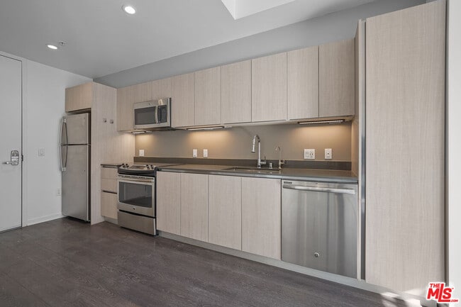 Photo - 5800 Harold Way Unit 208