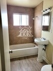 Photo - Spacious Upstairs 2-Bedroom, 1-Bathroom Ap... House