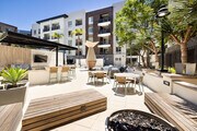 Outdoor Seating Area and Pool Deck | Elan Huntington Beach | Apartments in Huntington Beach, CA - Elan Huntington Beach Apartments