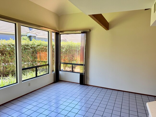 Photo - Private Oasis with Sunroom, Balcony & Lush Landscaping | 4BR Home Near Community Pool & Spa