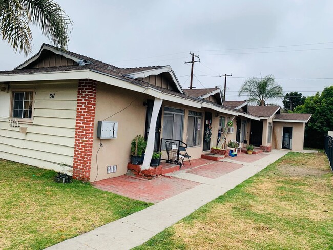 Building Photo - 311 W Guinida Ln Unit C