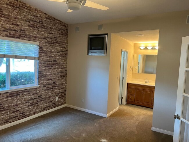 Photo - 55+ ONLY community gorgeous ranch style 2BR/2BA home with laundry, parking and community amenities