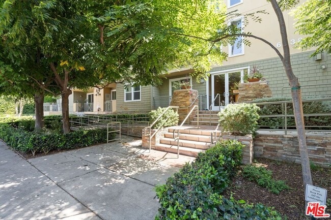 Building Photo - 6038 Carlton Way Unit 106
