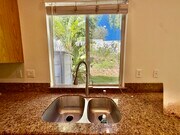 Kitchen with granite counters - 30863 Orleans Ct House