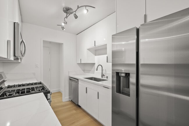 Kitchen v2 - 12030 Rochester Ave Unit 107