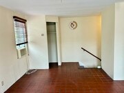Looking North at closer and stair railing. - 1001 N Sierra Bonita Ave Apartments Unit 1/2
