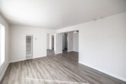 2BR, 1BA - 869SF - Living Room - Courtyard Apartments