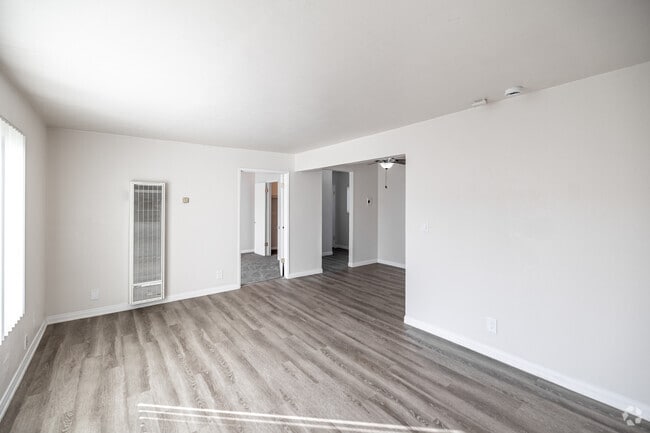 2BR, 1BA - 869SF - Living Room - Courtyard Apartments