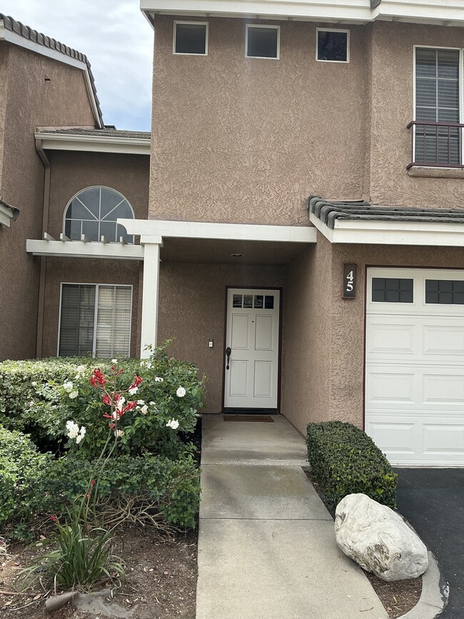 Front door and garage - 7367 Belpine Pl