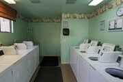Laundry Room - Cedar Villa Senior Apartments 55+