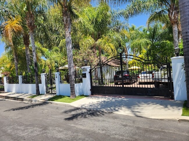 Driveway access available to a standard 120V outlet for convenient EV charging - 4230 Van Nuys Blvd