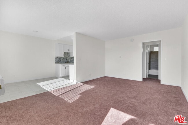 Building Photo - 7228 Allott Ave Unit 6