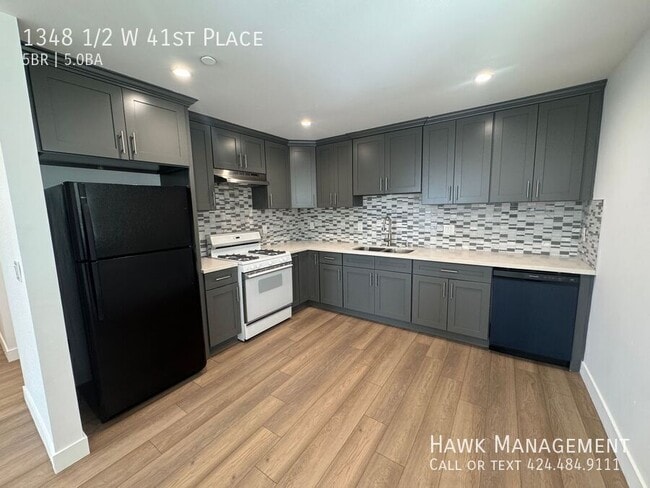 Building Photo - 1348 1/2 W 41st Place-