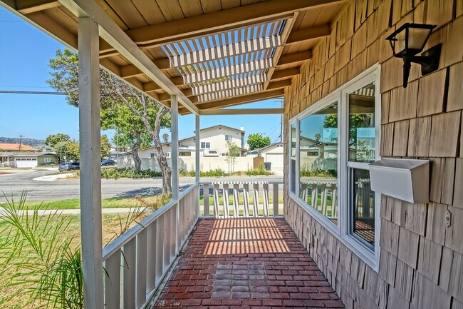 Photo - PARTIALLY REMODELED, CHARMING & BRIGHT HOME ON A LARGE CORNER LOT W/ FRONT PORCH, LARGE FRONT LAW...