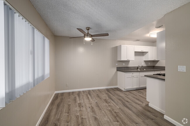 2BR, 1BA - 1,150SF - Dining Room - Camelot Apartments