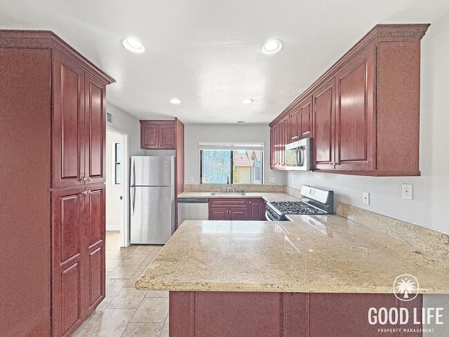 Building Photo - Light-Filled 2BD/2BA Top-Floor Condo in Mira Mesa with Granite Kitchen, Private Balcony & Pool