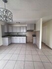 Photo - 1579 W 37th St Apartments