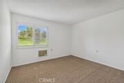 Photo - 2391 Via Mariposa W Condo Unit 2H