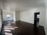 Photo - Lower level 1+1 w/in-unit laundry, assigned parking + water included!