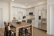 Modern Kitchen with Stainless Steel Appliances - Montessa Heights