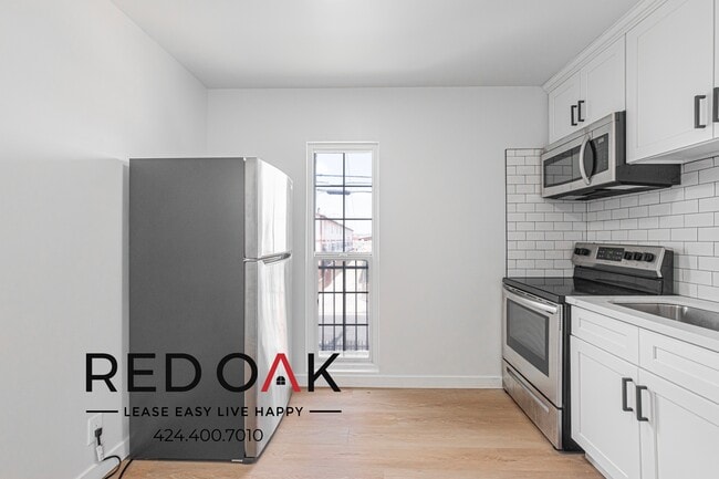 Photo - 1540 W 145th St Unit 1