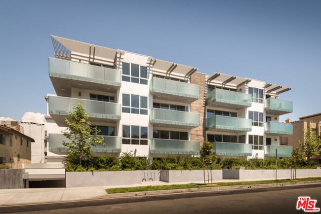 Building Photo - 12045 Guerin St Unit 304