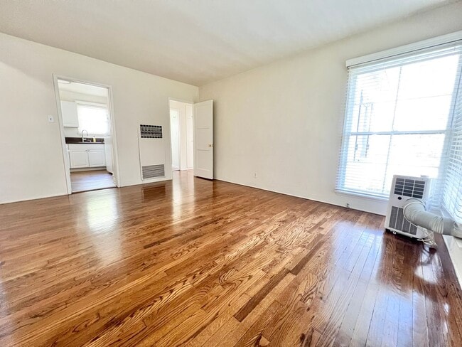 Photo - Charming 2-Bedroom Home with Hardwood Floors & Fireplace Near the Traffic Circle Unit 4510 E 15th St