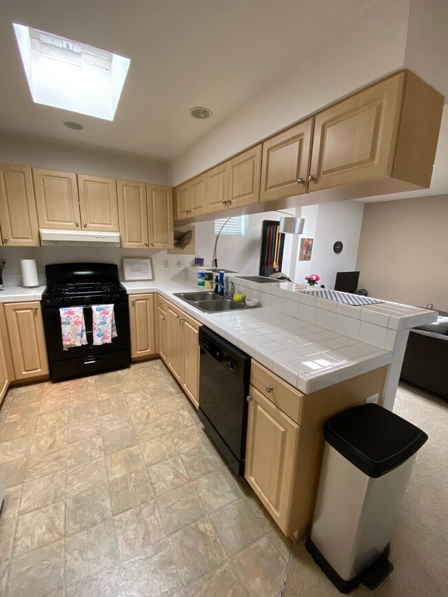 View of the kitchen and living room - 1322 Garnet Ave Unit 201