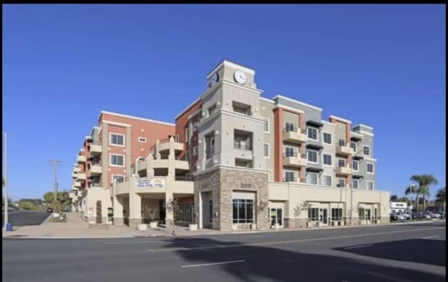 Street view of City Plaza Apartments in Escondido, California. - City Plaza Apartments
