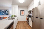 1BD, 1BA - 679SF - Kitchen - Paseos at Montclair North Apartments