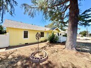 Photo - Charming 3 Bedroom Home with Included Landscaping, Spacious Backyard & Carport