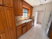 Photo - Charming 2 Bed Home with A/C, 2 Car Garage, Huge Yard & In-Unit Laundry