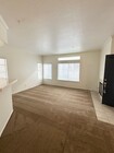 Open concept living room - 4581 Warner Ave Condo Unit #102