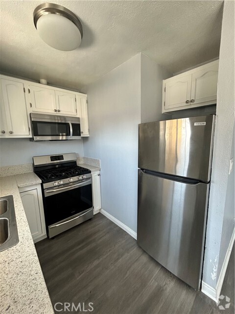 Building Photo - 5165 Pickford St Unit 1/4 Rental
