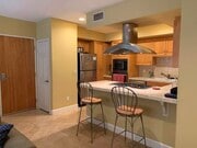 Kitchen with stainless steel appliances - 937 12th St Unit 208