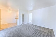 Living room with gas wall heater - 4030 38th St #7