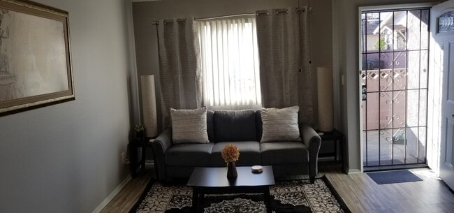 living room - 4089 W 141st St Apartments Unit C
