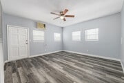 3BR, 2BA - 900SF - Living Room - 1032-1036 S Normandie Ave
