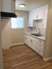 Kitchen cabinetry is new with plenty of room for dishes, pots and pans . - 9226 Palm St Unit B
