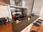 Photo - Industrial-Chic Loft in East Village | 1,049 Sq Ft | Gym & Rooftop