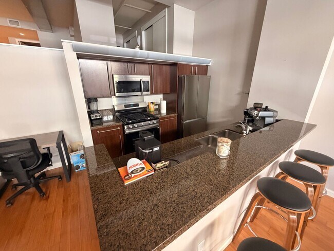 Photo - Industrial-Chic Loft in East Village | 1,049 Sq Ft | Gym & Rooftop