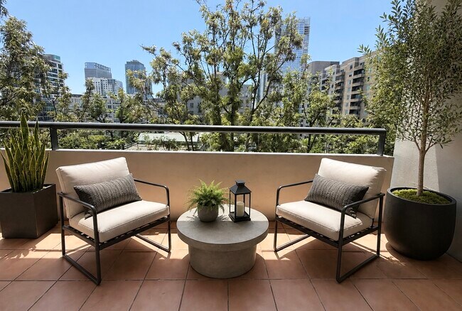 AI staged balcony - 600 W 9th St Unit 814