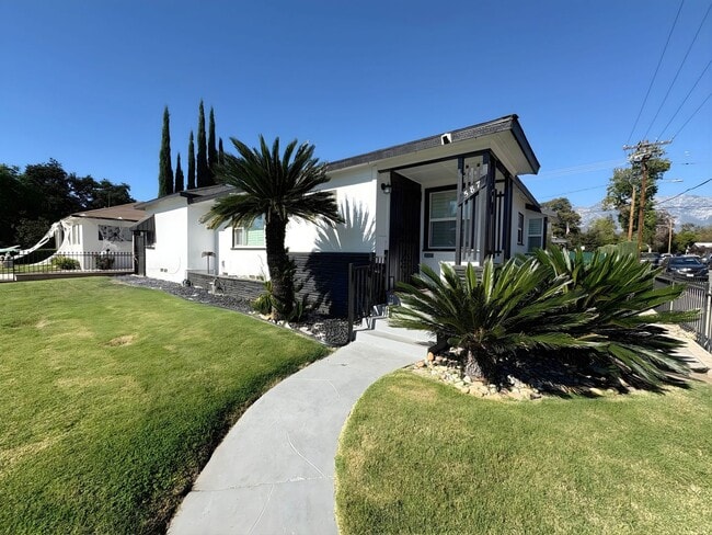 Building Photo - 587 E Arrow Hwy Unit 587 E. Arrow Hwy