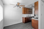 2BR, 1.5BA - 940SF - Dining Room, Kitchen - The Bungalows Apartments
