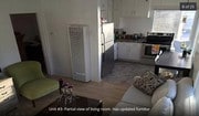 Part of living room & kitchen before remodel - 712 Zanzibar Ct Unit B