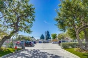 Gated parking - 4040-4060 S Hoover St (B) Apartments