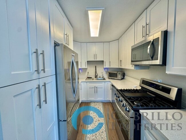 Photo - Beautifully Renovated 4BD/2BA Home in Cent...