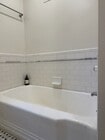 Full tiled bathtub - 9933 Robbins Dr Unit 10